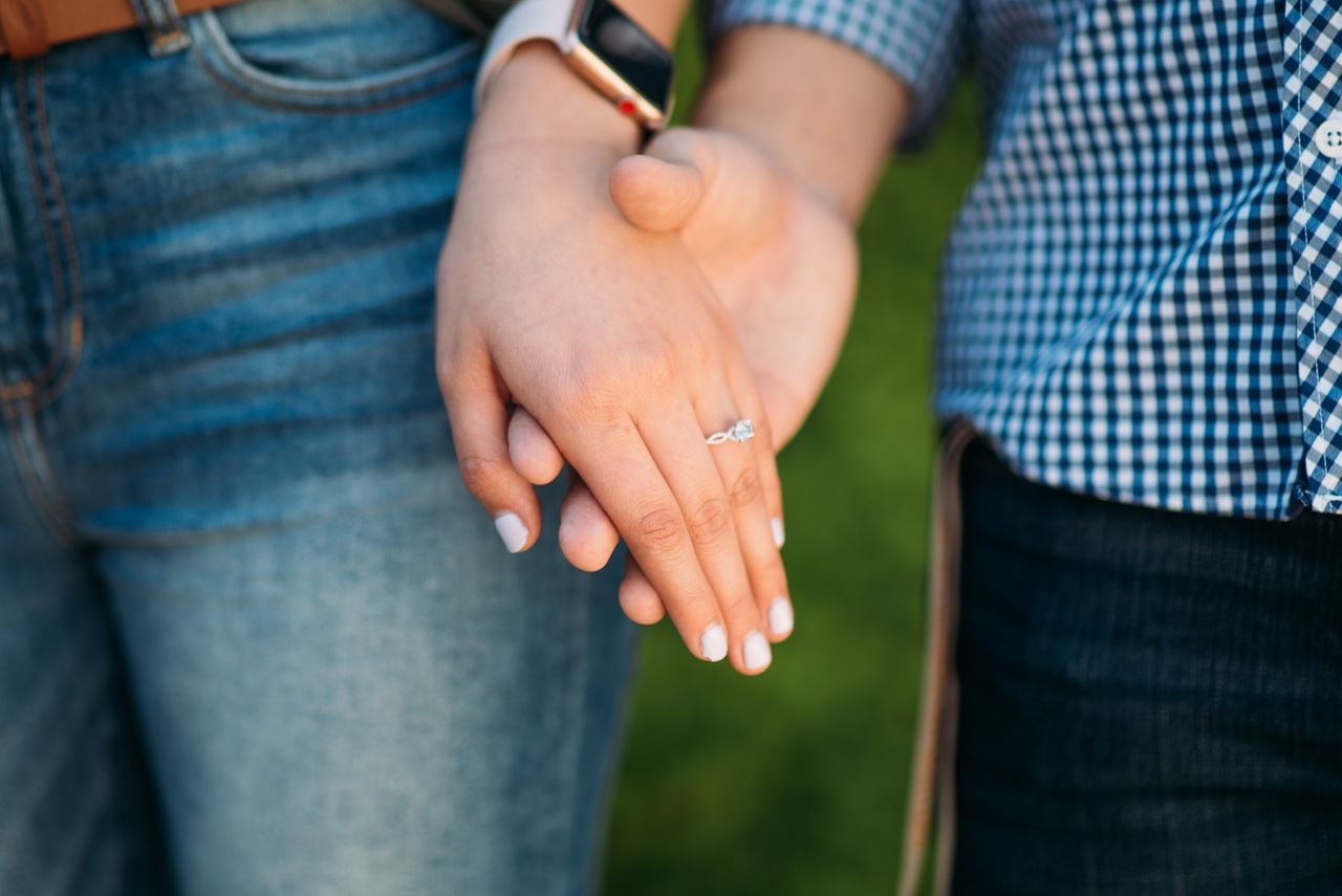 A couple holding hands